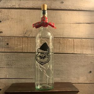 Grinch face with santa hat wine bottle lantern